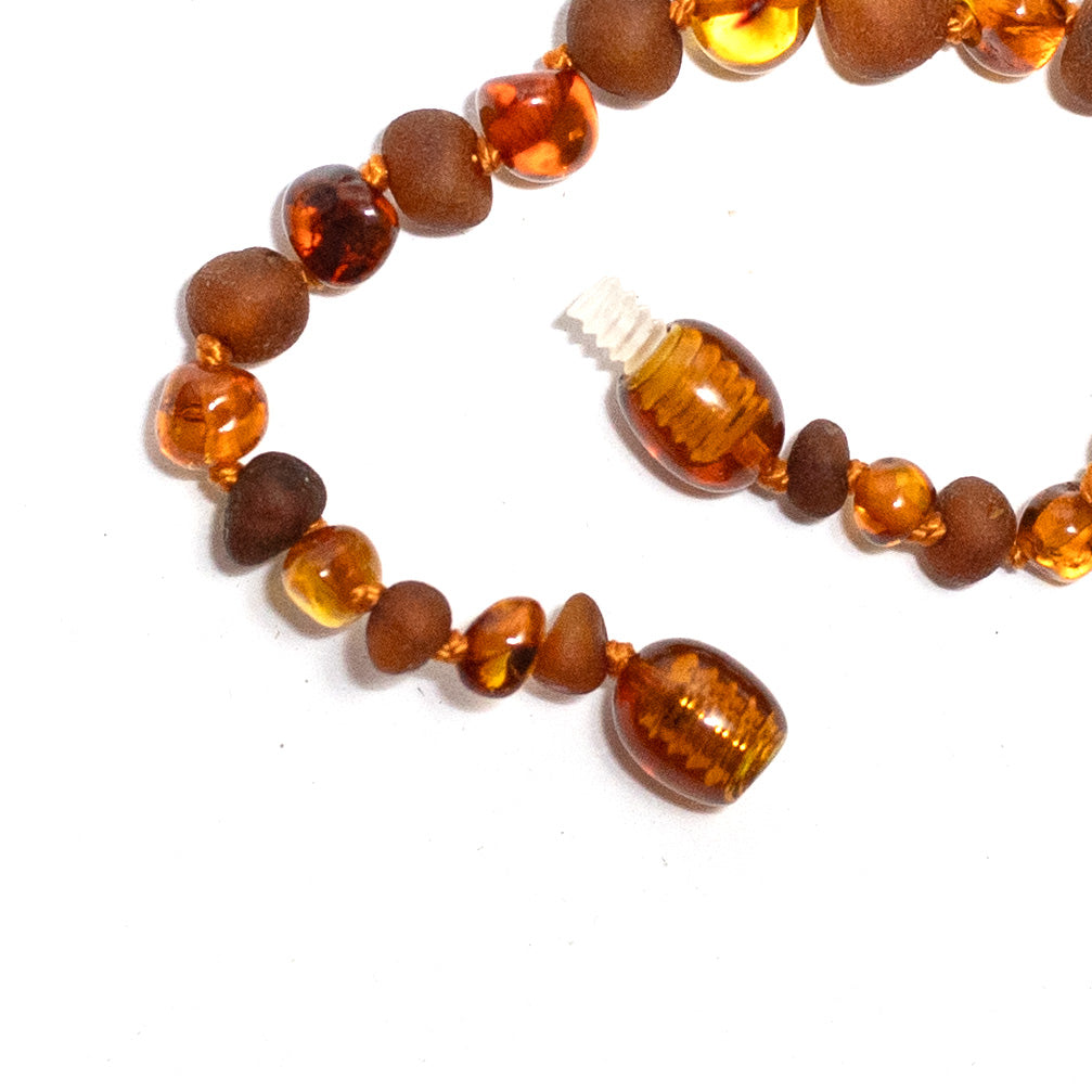Barnsteen armbandje – ronde kraaltjes – gepolijst/ruw – 14 cm – Cognac