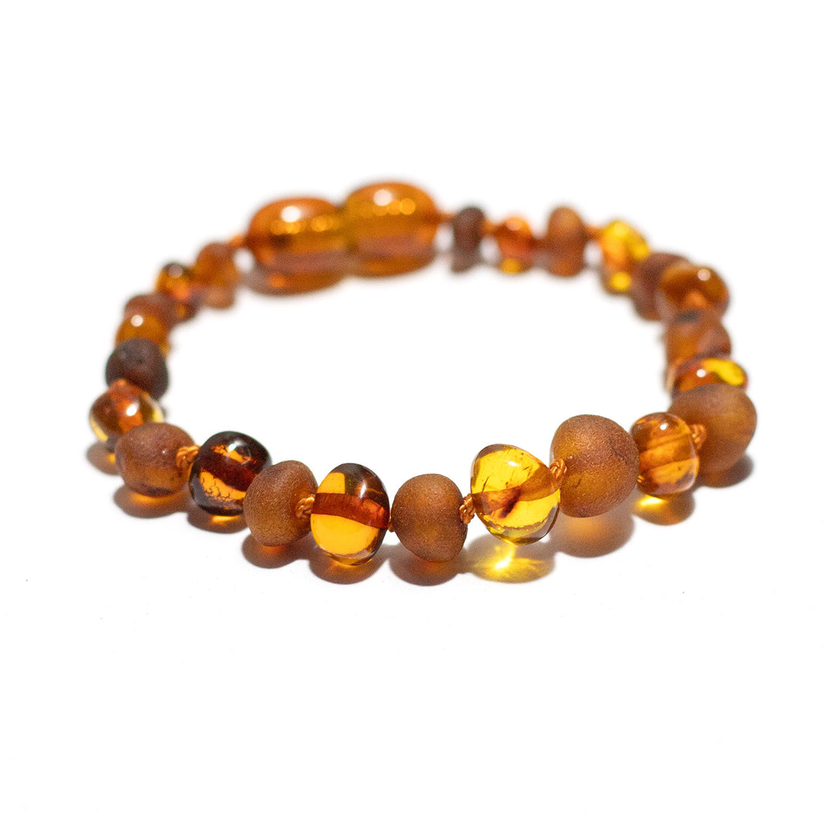 Barnsteen armbandje – ronde kraaltjes – gepolijst/ruw – 14 cm – Cognac