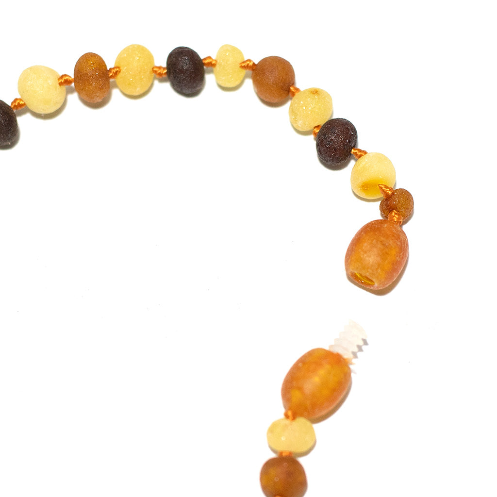 Barnsteen ketting – ruwe ronde kraaltjes – 33 cm – 4 kleuren