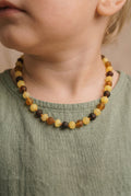 Barnsteen ketting – ruwe ronde kraaltjes – 33 cm – 4 kleuren