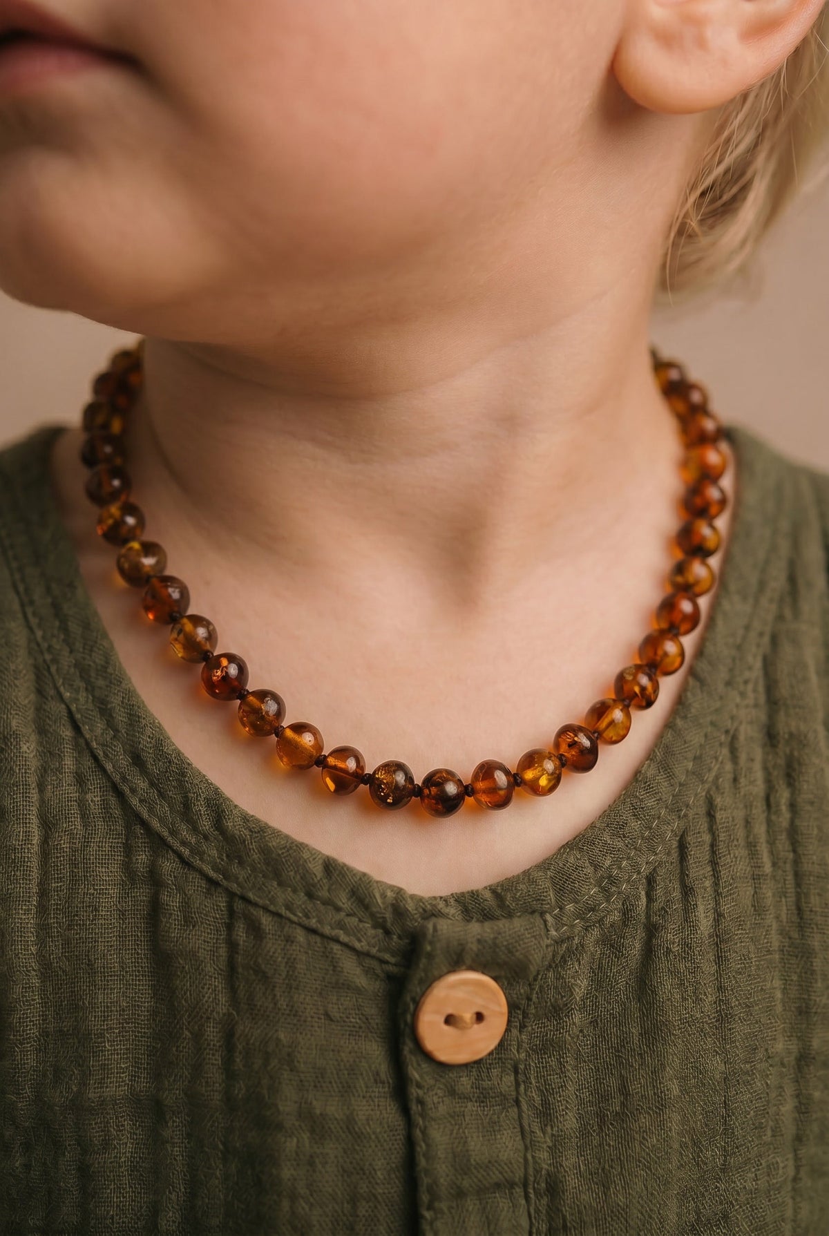 Barnsteen ketting – ronde kraaltjes – 33 cm – cognac