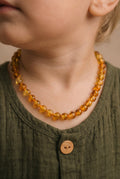 Barnsteen ketting – honing – gepolijste ronde steentjes – 33 cm