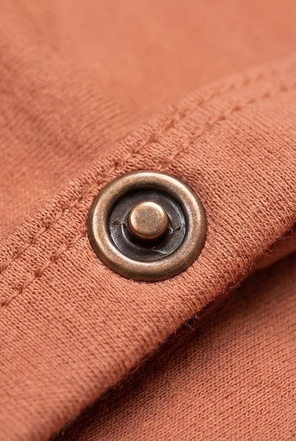 Wollen babypakje met voetjes – merinowol – Coral Gold