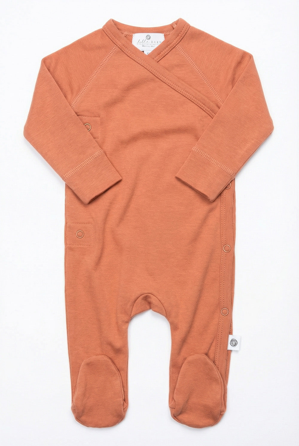 Wollen babypakje met voetjes – merinowol – Coral Gold