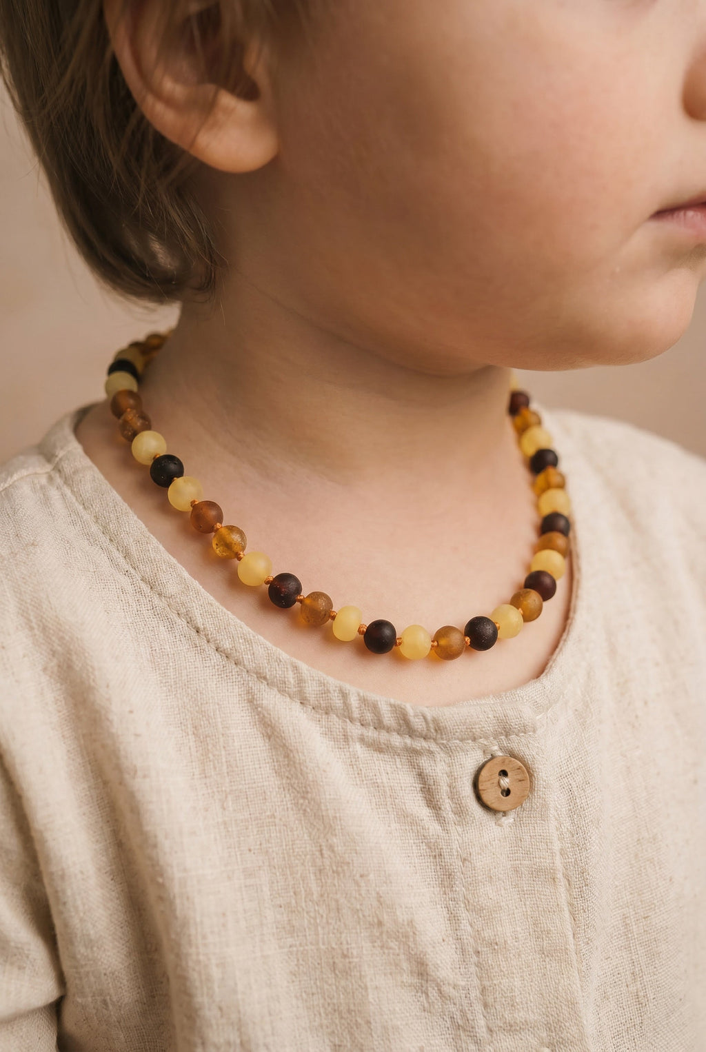 Barnsteen ketting – ruwe ronde kraaltjes – 36 cm – 4 kleuren