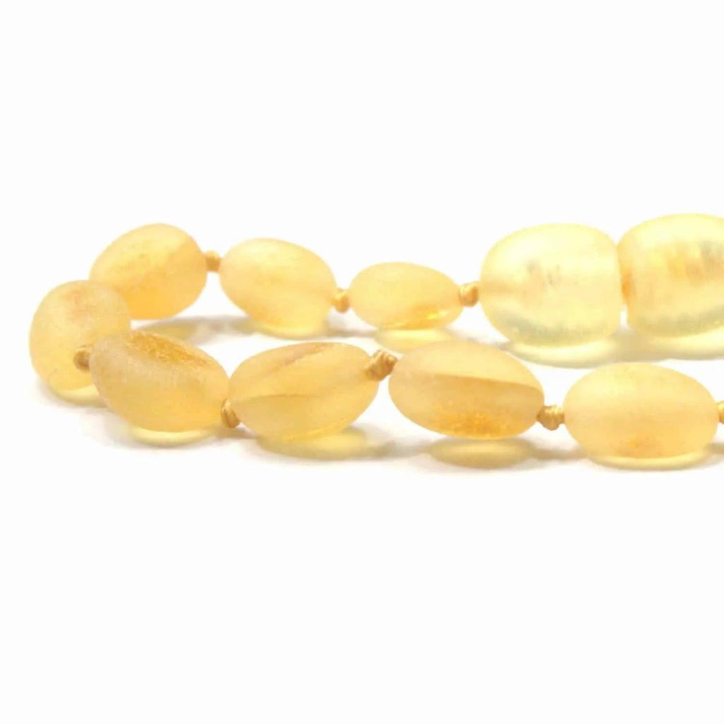 Barnsteen armbandje – ovalen ruwe kraaltjes – Citroen – 14 cm