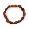 Barnsteen armbandje – ovalen ruwe kraaltjes – Cognac – 14 cm
