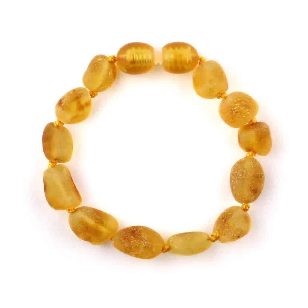 Barnsteen armbandje – ovalen ruwe kraaltjes – Honing – 14 cm