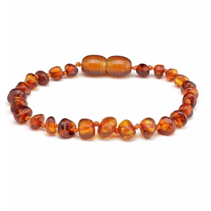 Barnsteen armbandje – ronde kraaltjes – gepolijst – 14 cm – Cognac
