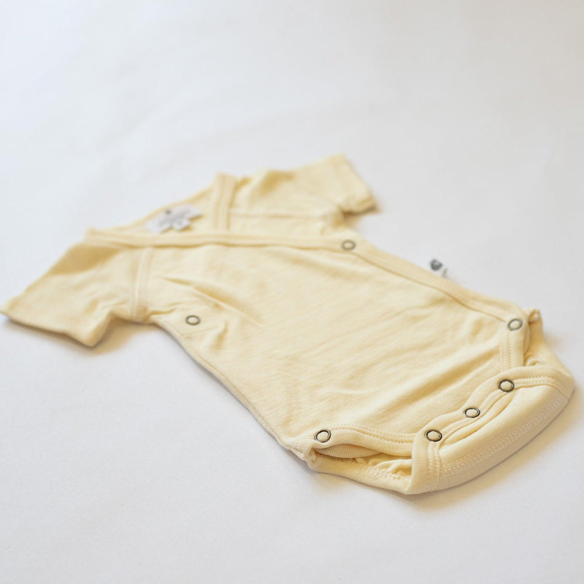 Wollen overslagromper korte mouw – merinowol – Naturel