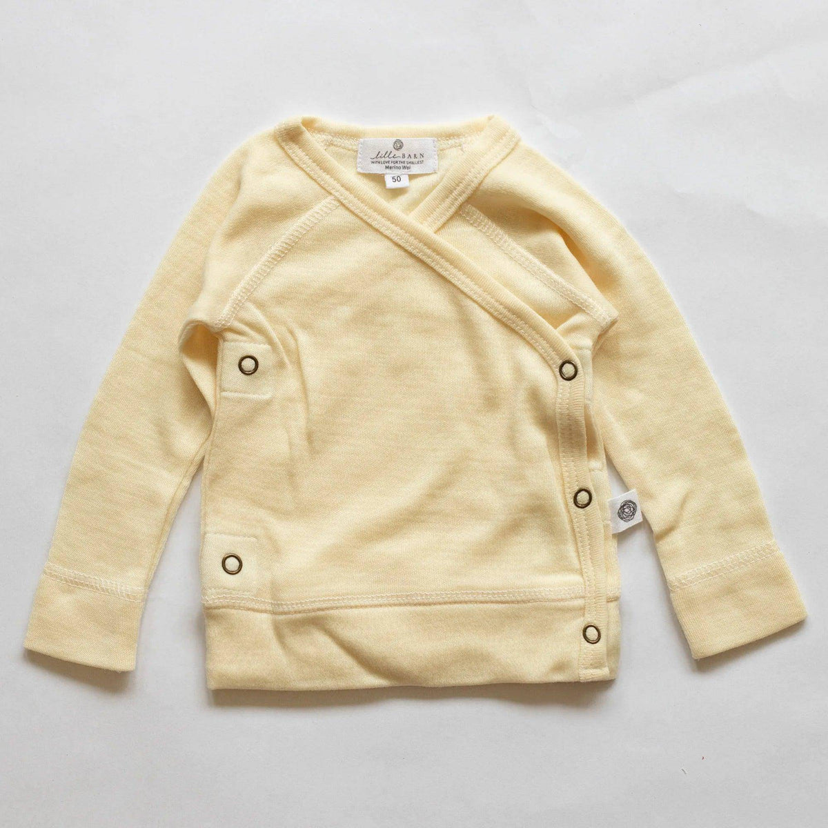 Baby wollen overslagtrui – merinowol – Naturel