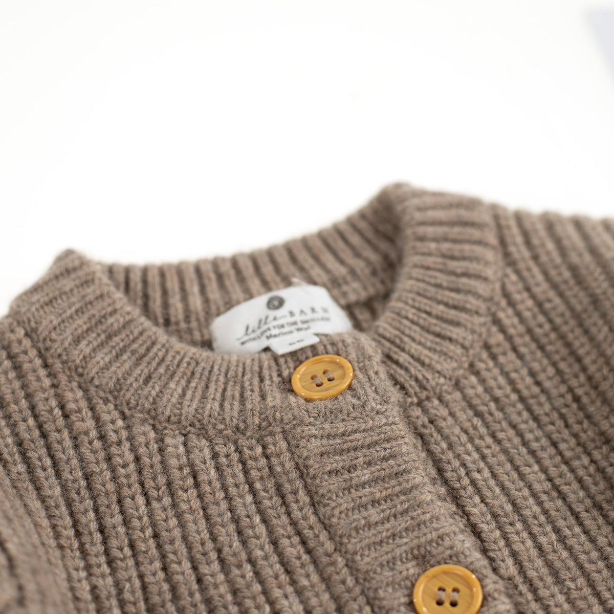 Gebreid wollen babyvestje – merinowol – Cobble