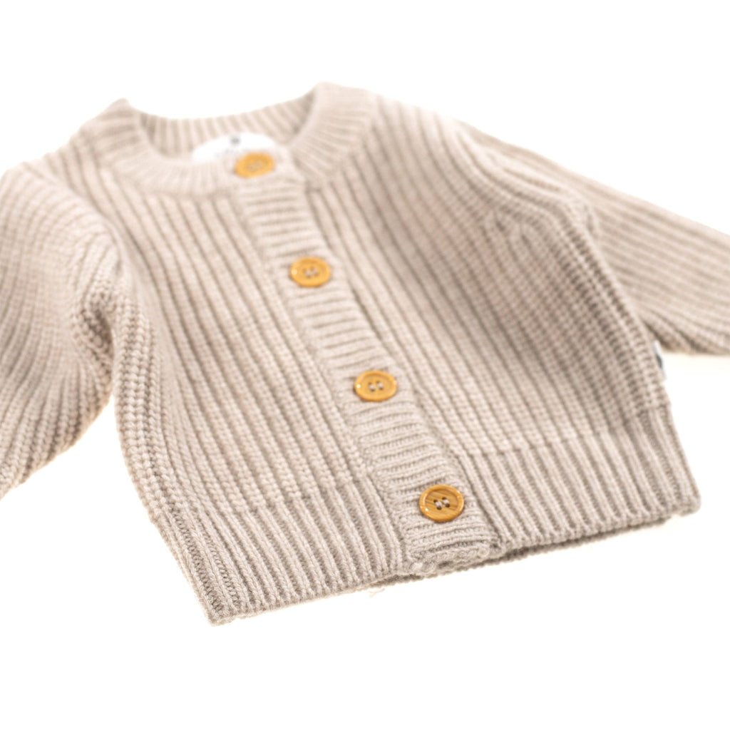 Gebreid wollen babyvestje – merinowol – Garlic