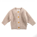 Gebreid wollen babyvestje – merinowol – Garlic