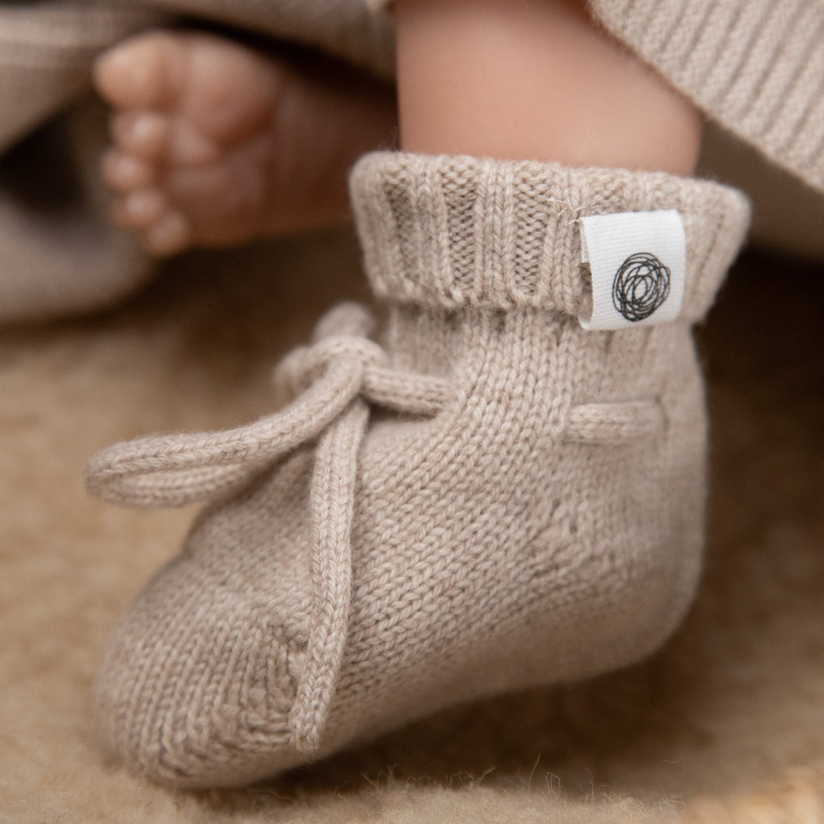 Wollen babysokjes – merinowol – Garlic