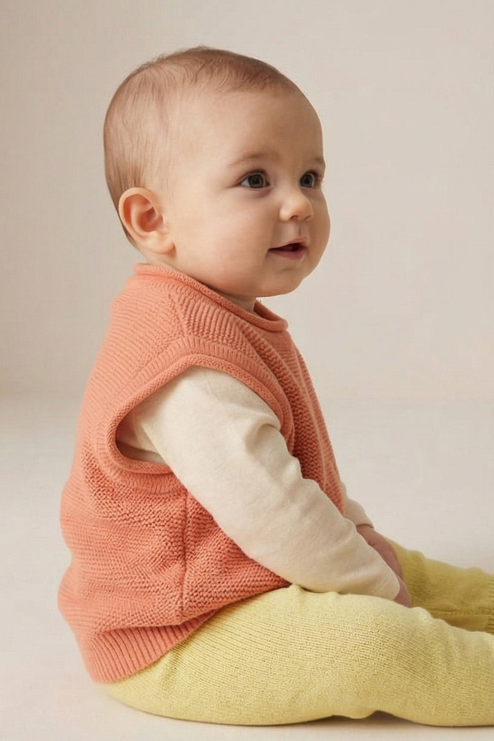 Merinowol gebreide babyspencer – Peach Fuzz