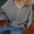 Gebreid wollen babyvestje – merinowol – Cobble