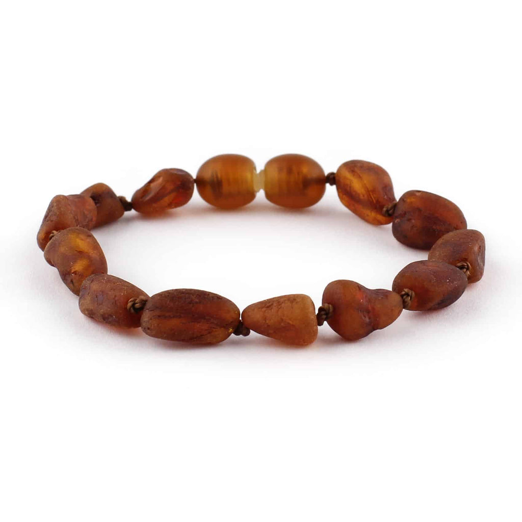Barnsteen armbandje – ovalen ruwe kraaltjes – Cognac – 14 cm