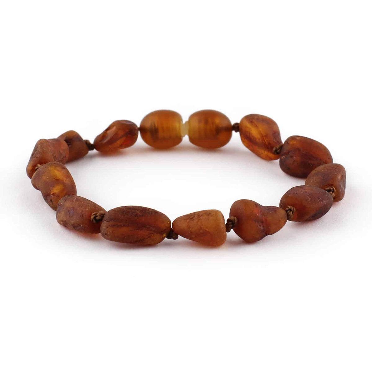 Barnsteen armbandje – ovalen ruwe kraaltjes – Cognac – 14 cm